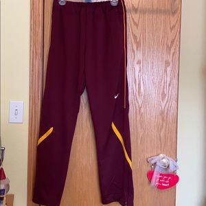 Size medium maroon Nike dri- fit sweatpants.